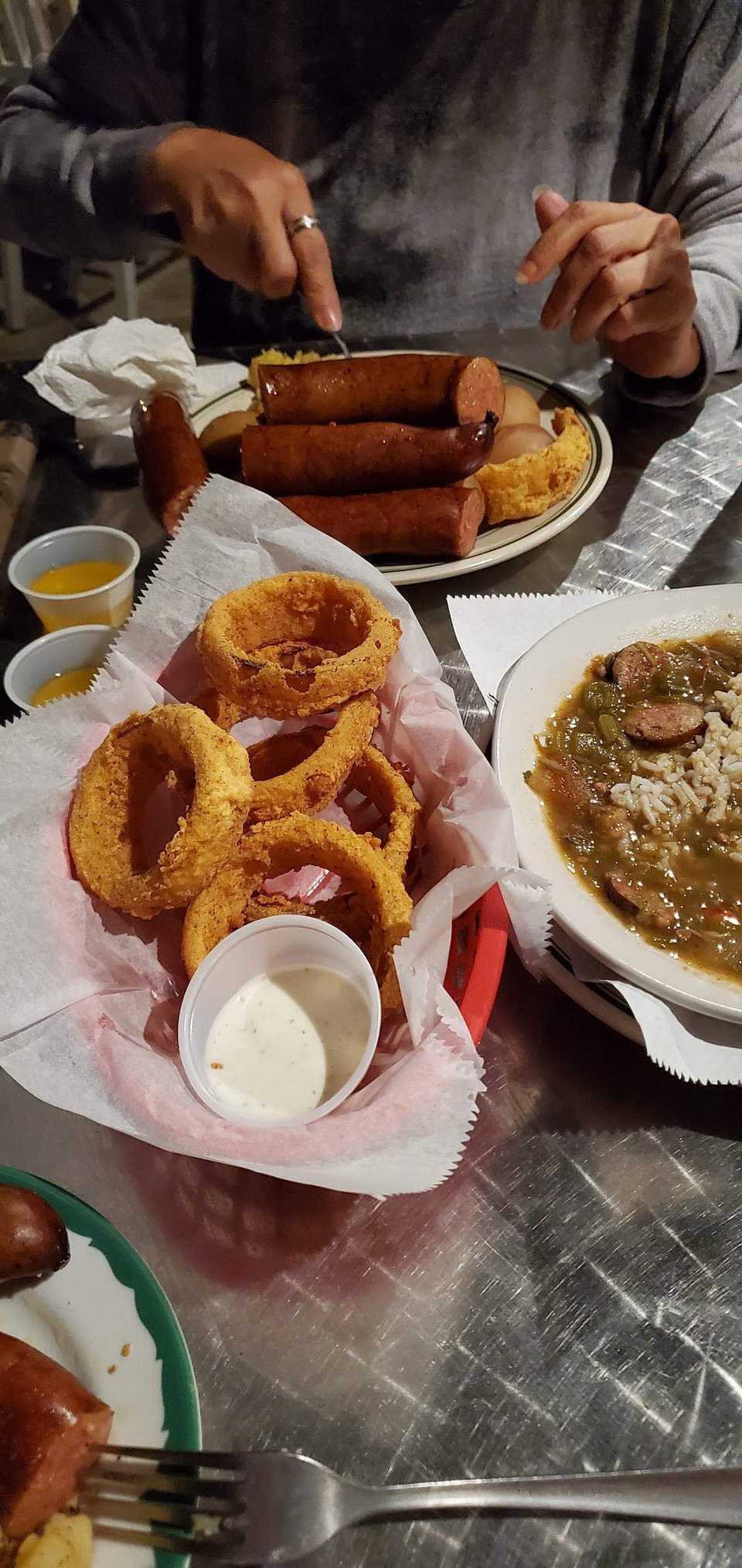 Onion Rings Gumbo Sausages and Potatoes